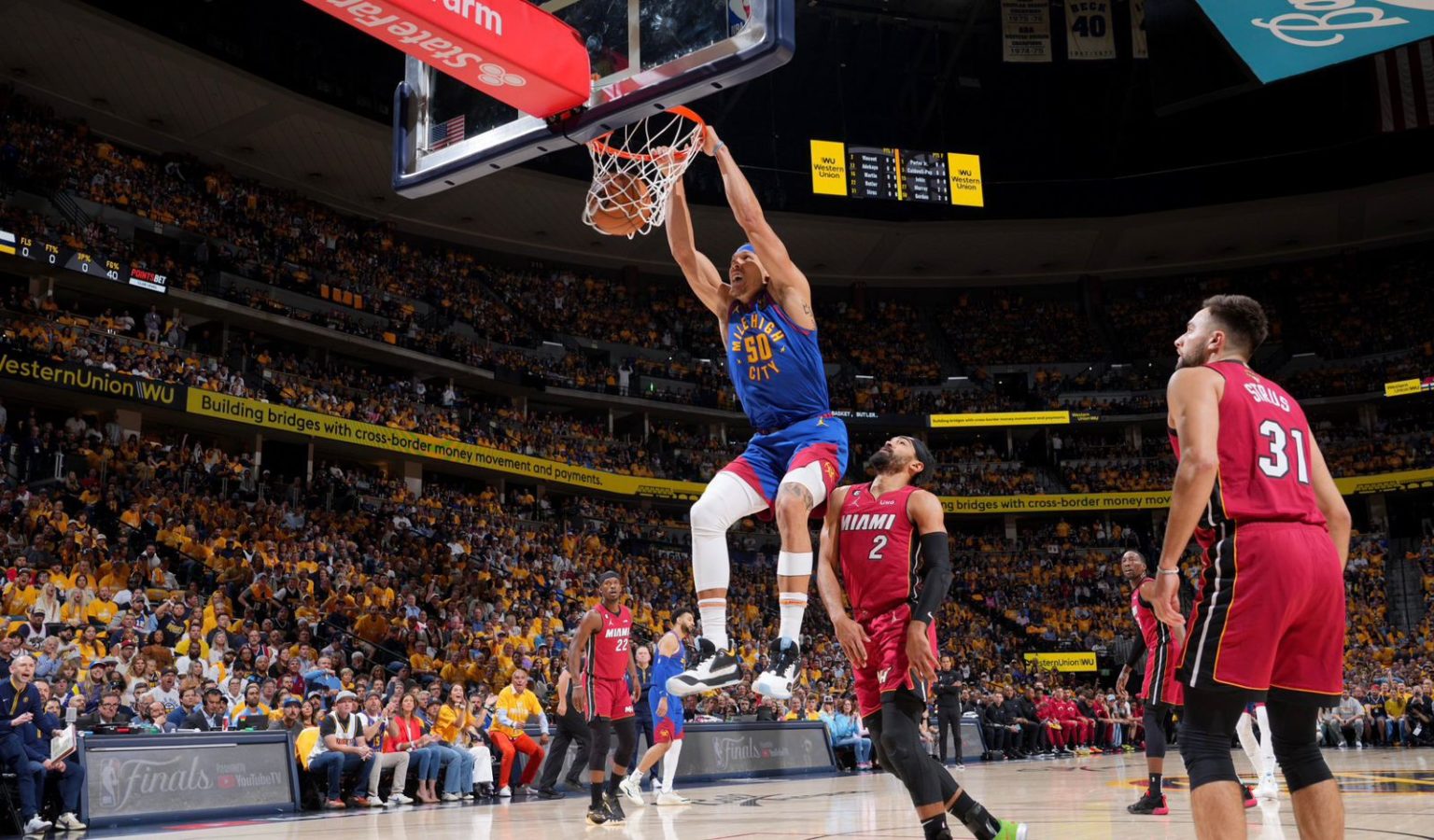 Imagen principal del artículo: Denver Nuggets continúa su racha de victorias en casa al vencer a Miami Heat en el juego 1 de las finales